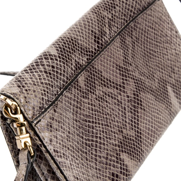 Tory Burch Crossbody Bag
Neutrals SuedeAnimal Print Gold-Tone Hardware. - Picture 5 of 6
